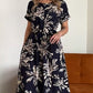 Rochie mulată cu imprimeu floral și guler rotund