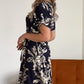 Rochie mulată cu imprimeu floral și guler rotund