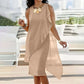 Rochie elegantă fără mâneci cu gât rotund și plasă asimetrică